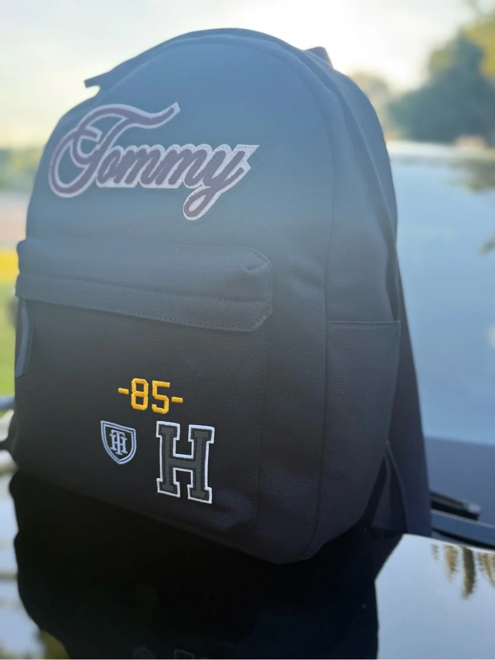 Tommy Hilfiger Black Backpack with Maroon Script Patch
